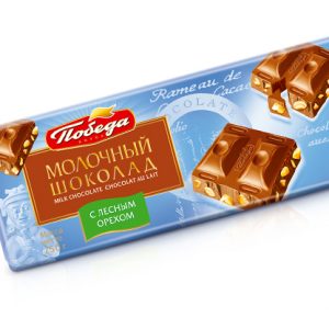 Шоколад молочный с орехом
